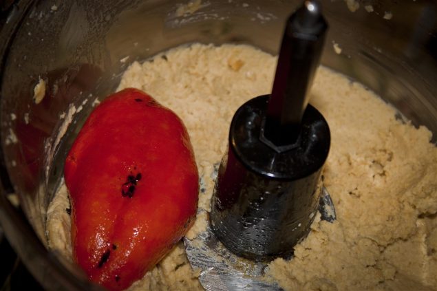For a MUCH better flavor, roast your own peppers. It's very simple. Roasted red pepper waiting to be blended into hummus.